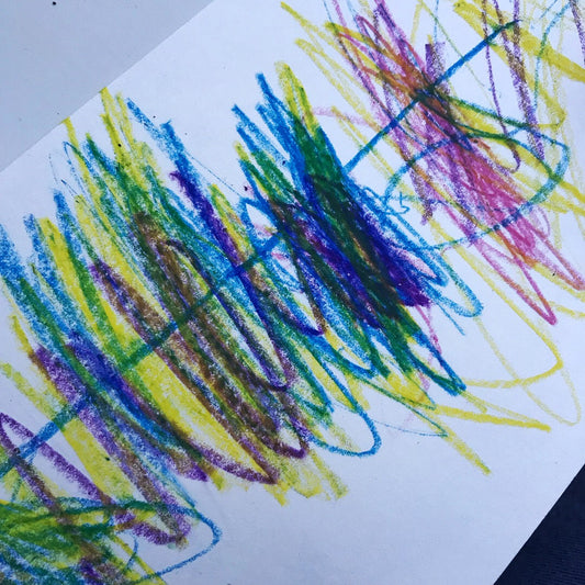 Childlike colorful crayon scribbles