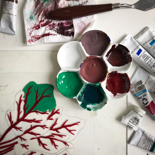 paint palette with unfinished painting