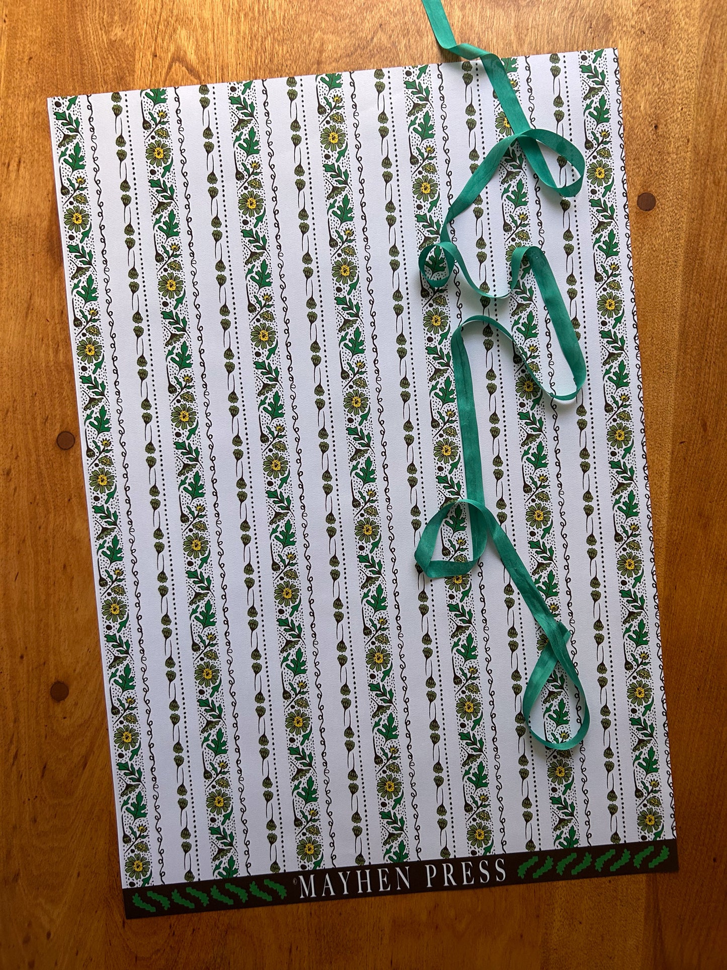 wrapping paper sheet with floral stripe pattern on a white background 