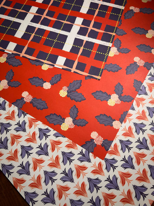 Collection of wrapping paper sheets with coordinating patterns 