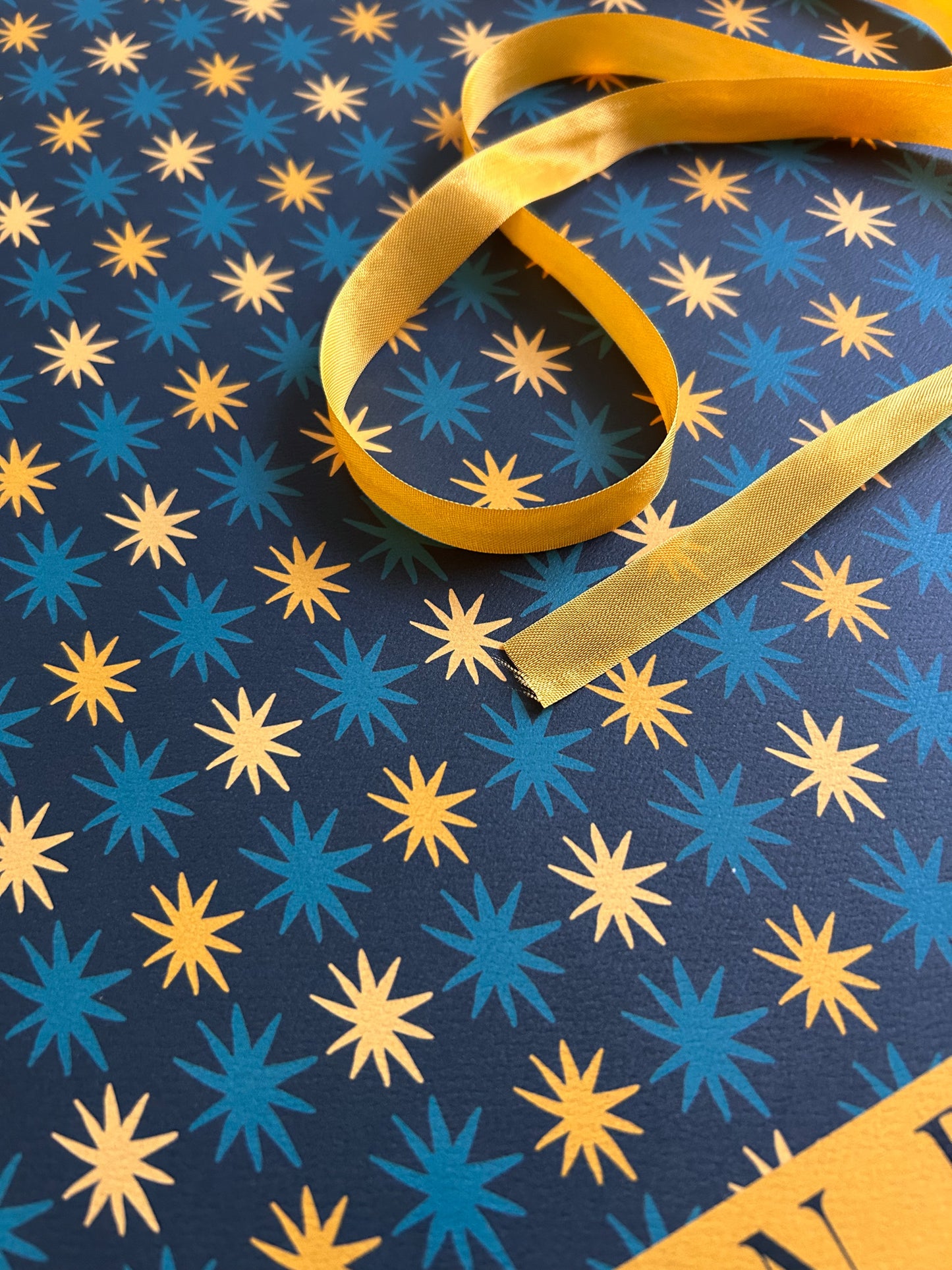 close up of star patterned wrapping and crafting paper sheet