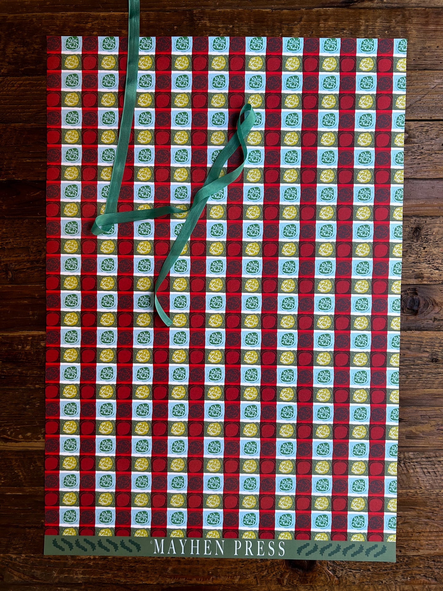 artist designed patterned wrapping and crafting paper featuring a dots and stripes design