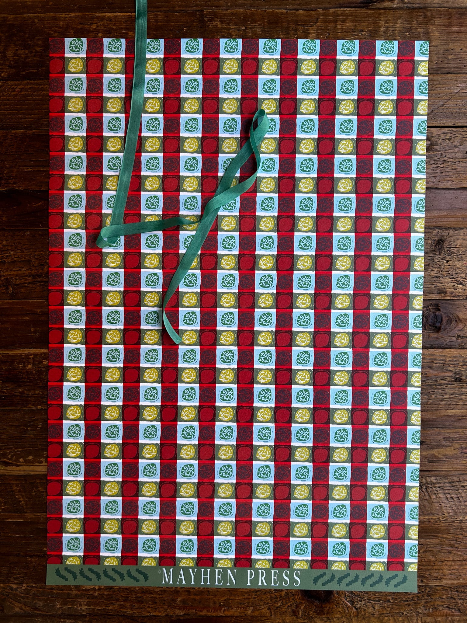 artist designed patterned wrapping and crafting paper featuring a dots and stripes design